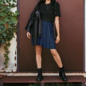 Unisex eco-friendly mesh shorts in earthy tones with drawstring waist and breathable fabric, displayed outdoors on a model near trees.